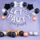 Party Decor for Pets Birthday Party. It is silver in colour and has a beautiful Personalised Bone shape balloon in the middle with foil balloons around it along with a Happy Birthday Banner.